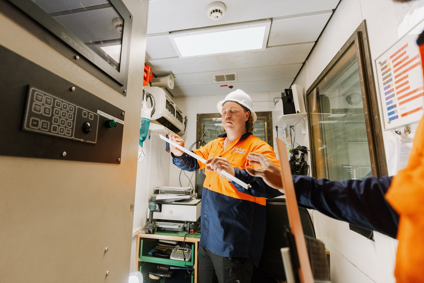 Marine AC maintenance work in boat office space