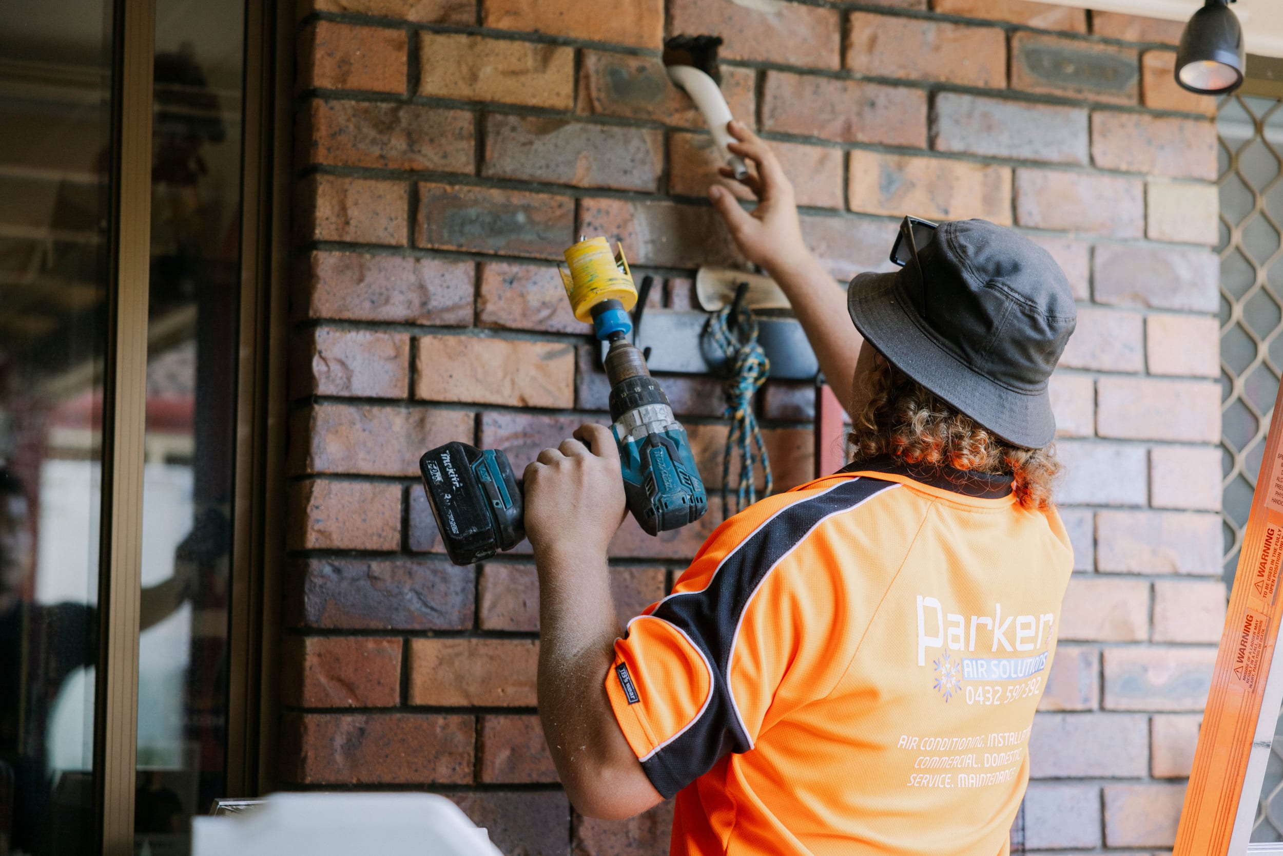 Precision drilling into brickwork for a Parker Air split system installation