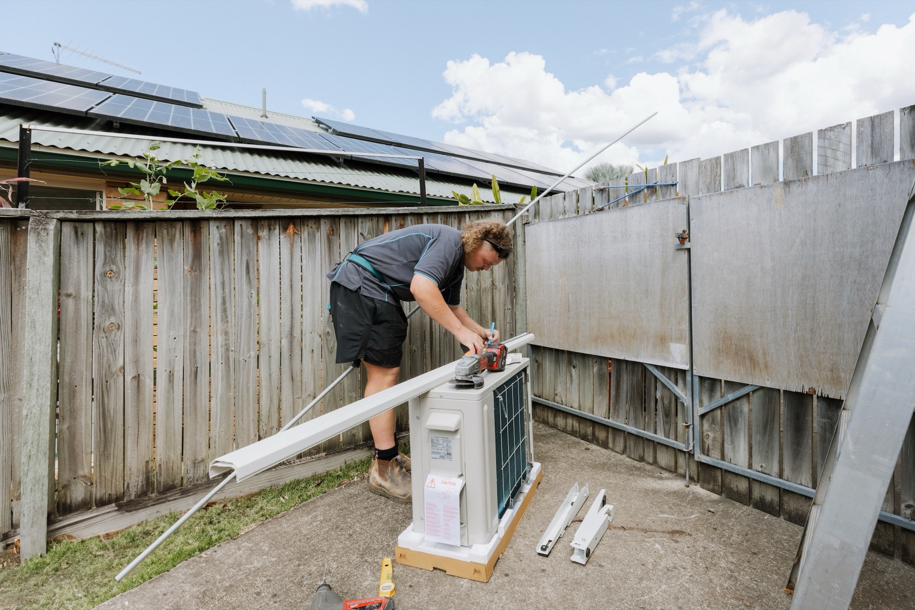 Professional outdoor aircon compressor pipe preparation