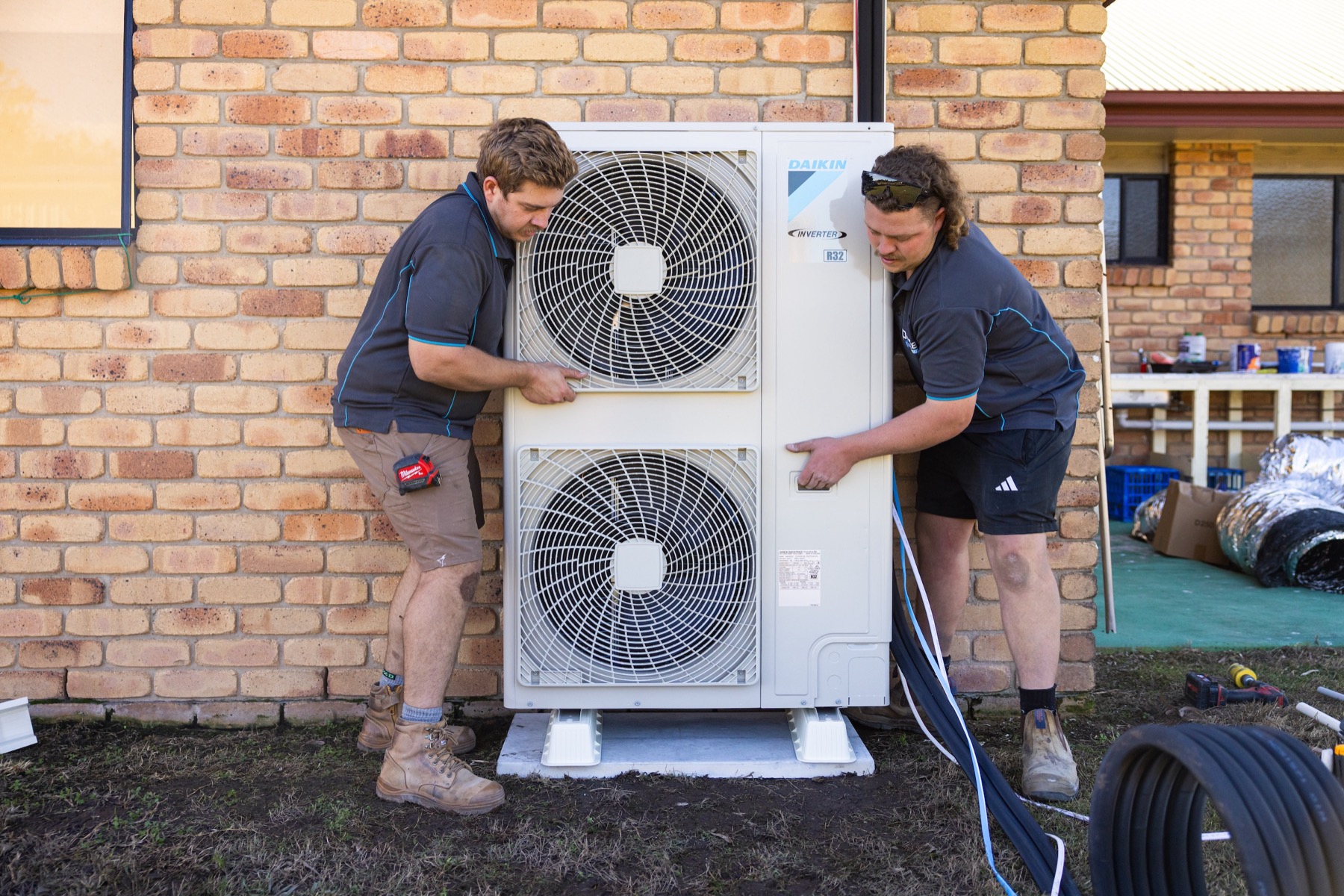 Parker Air Solutions team working on a ducted air conditioning installation